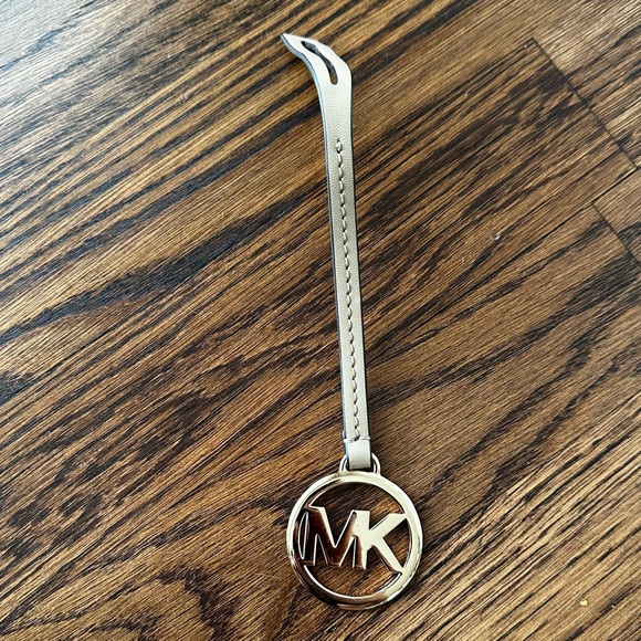 Michael Kors Accessories - Michael Kors Tan Leather Bag Leather Strap Gold MK Circle Charm